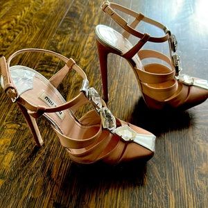 Miu Miu stylish nude colour stilettos.